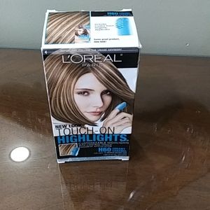 LOreal touch on highlights H 60 creamy caramel. For light to medium brown hair.